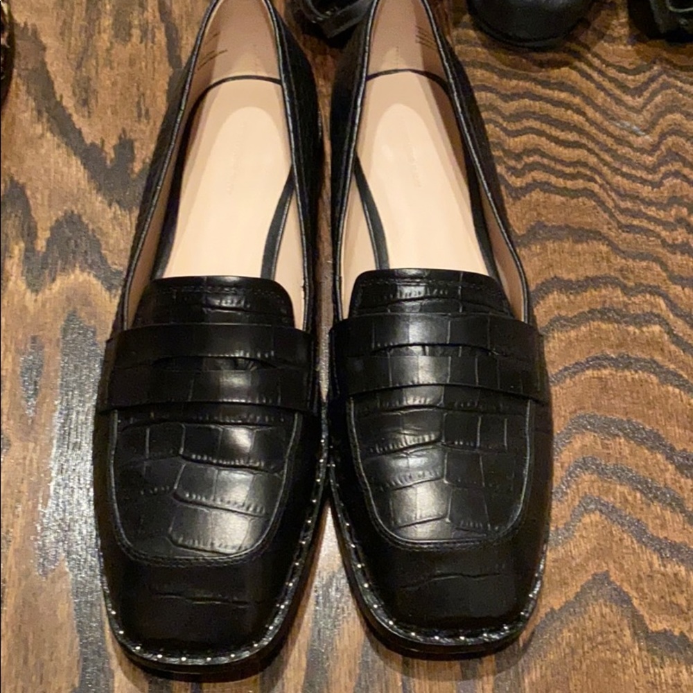 Black leather loafers